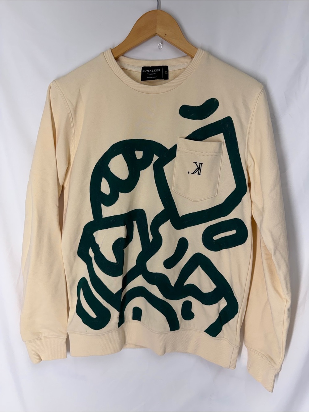 Cream Crewneck Sweater with Dark Green Graphic Pocket